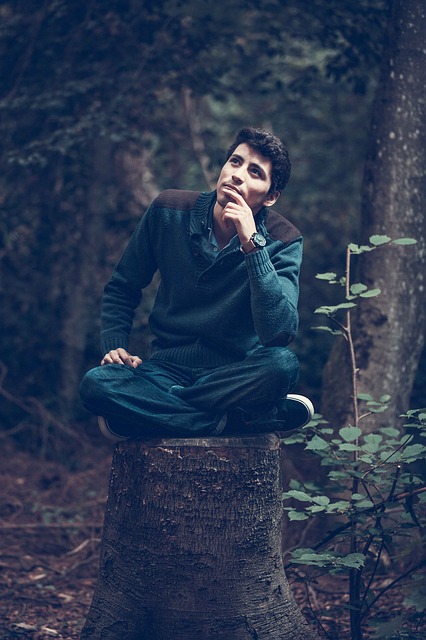 man thinking forest